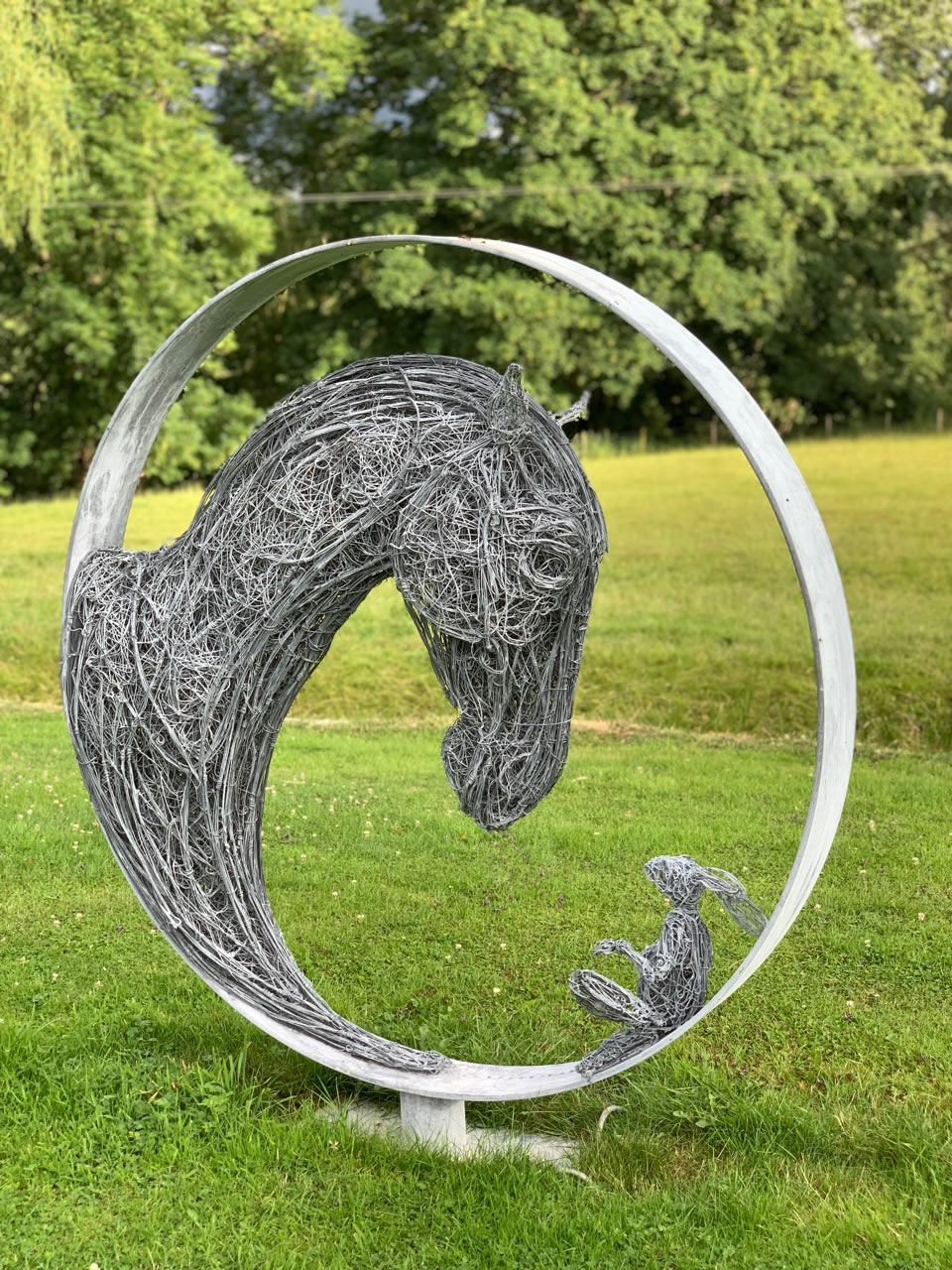 Wire sculptor Rupert Till�s most popular wire sculpture for a  garden in 2021 was this �Never Alone� . At 150cm diameter in aged zinc this garden sculpture was gifted to Hospice in Bray last October. In 2022 he has been commissioned to create a 2m version for Radley College in Oxfordshire